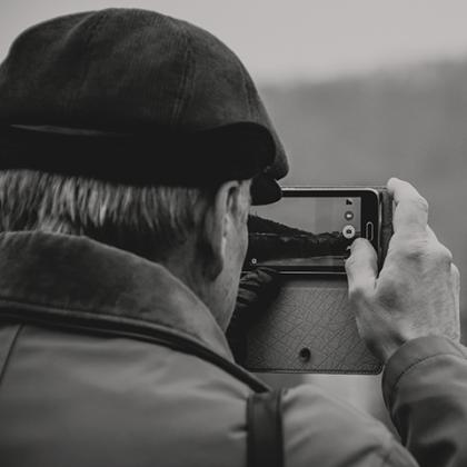 Man taking photo square